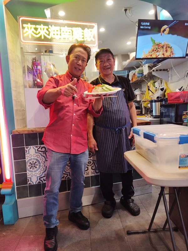 Martin Yan with a stallholder at Burwood Chinatown